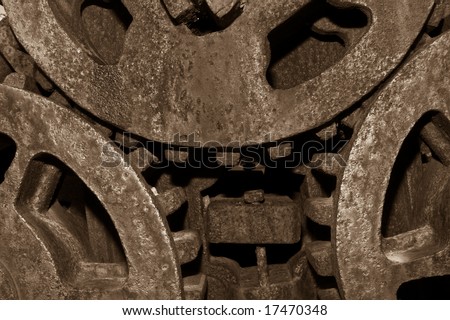Sepia Toned Old rusty gears enmeshed on an antique sugar mill