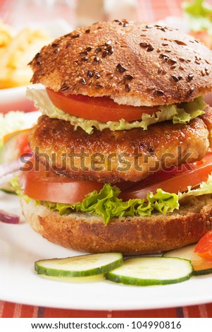 Vegetarian soy burger with tomato and lettuce