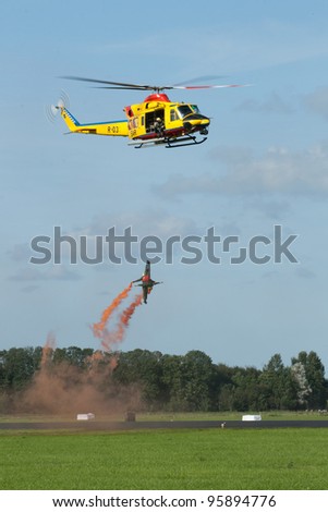 LEEUWARDEN,FRIESLAND,HOLLAND-SEPTEMBER 17: Agusta AB-412 SP Helicopter at the “Luchtmachtdagen” Airshow on September 17, 2011 at Leeuwarden Airfield,Friesland,Holland