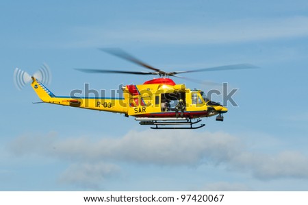 LEEUWARDEN,FRIESLAND,HOLLAND-SEPTEMBER 17: Agusta AB-412 SP Helicopter performs at the “Luchtmachtdagen” Airshow on September 17, 2011 at Leeuwarden Airfield, Friesland,Holland
