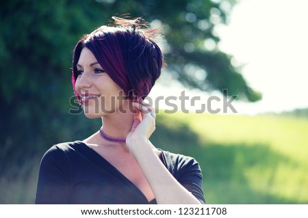 Smiling girl in the summer light