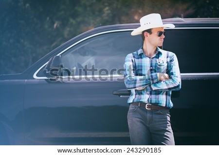 Texas ranger with a car