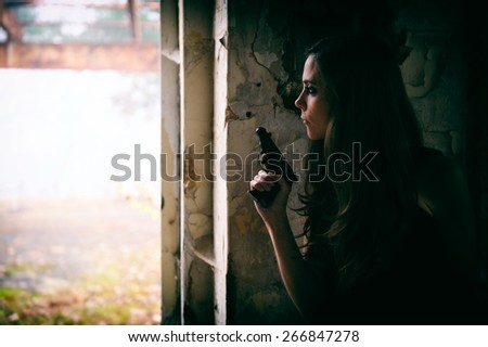Danger woman with a gun