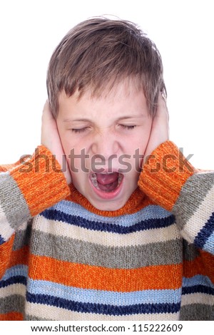 Young child shouting and cover his ear with hand