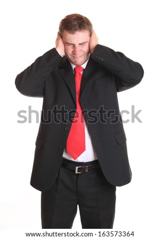 Closeup portrait of man holding hands to ears covering to shut out noise, isolated on white background
