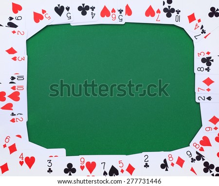 Frame made of french cards on green