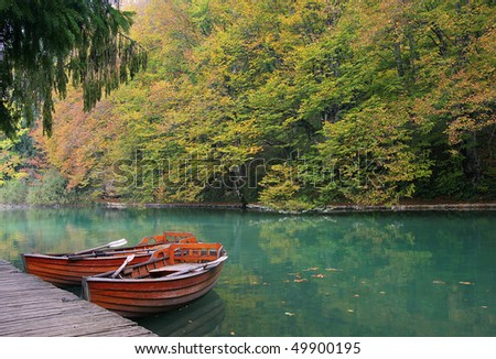 Autumn picture of boats on the bank in autumn