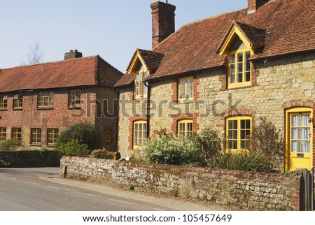 Brick and stone cottages at Easebourne near to Midhurst. West Sussex. England