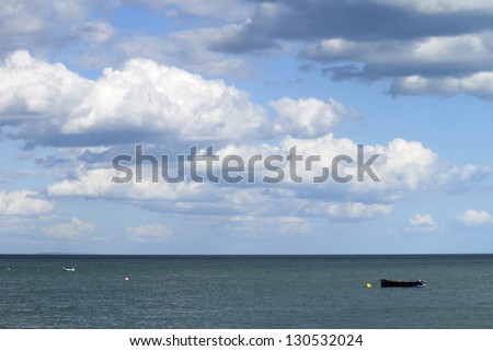 Fishing boat moored at Selsey. West Sussex. England. View towards Isle of Wight in distance.
