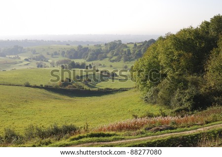 England. West Sussex. Worthing. Countryside on South Downs with golf course. Sea in background