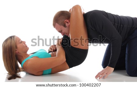 stock-photo-mma-female-fighter-taking-an-opponent-by-surprise-with-a-triangle-choke-knockout-100402207.jpg