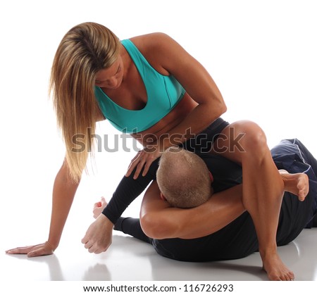 stock-photo-mma-female-fighter-executing-a-triangle-choke-from-the-mount-116726293.jpg