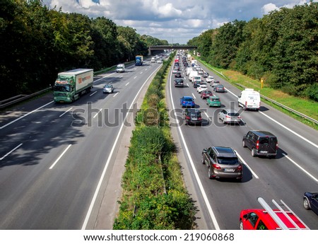 BOCHUM, GERMANY - SEPTEMBER 11, 2014: Typical scene during rush hour in a traffic jam with rows of cars