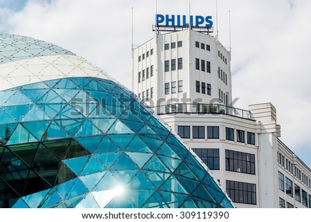 Eindhoven, Netherlands - May 24, 2015: Day view of the old Philips factory building and modern futuristic building in the city centre of Eindhoven. Western Europe