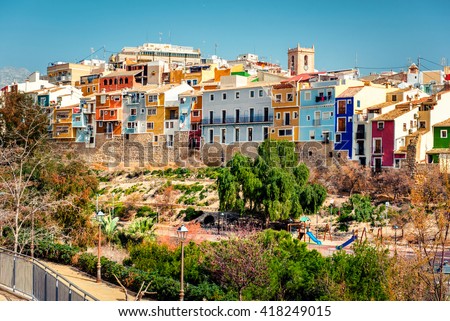 Multicolored crowded houses of Villajoyosa / La Vila Joiosa town. Coastal town of Costa Blanca. Province of Alicante, Valencian Community, Spain
