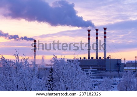 Boiler room pipes against the beautiful sky at sunrise