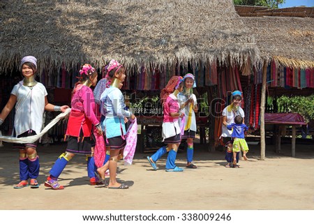 Thailand - DECEMBER 26, 2013: women of a tribe of long-necked women show national dance