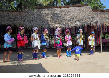 Thailand - DECEMBER 26, 2013: women of a tribe of long-necked women show national dance