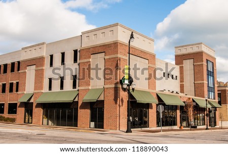 New Commercial, Retail and Office Space available for sale or lease in generic red brick office building with awning