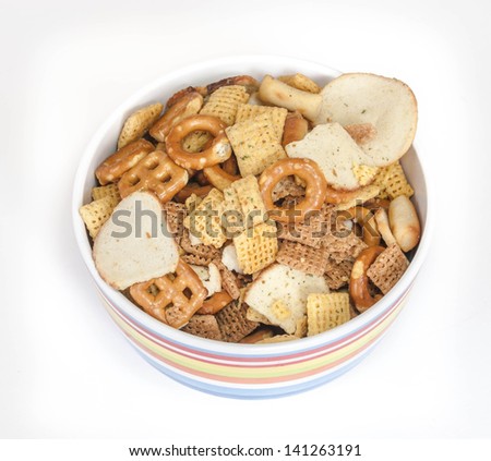 Big bowl or tray of party mix with copyspace. Let\'s party and have a great time! Life is full of fun!