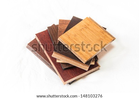Hardwood flooring samples including maple, oak, bamboo and cork
