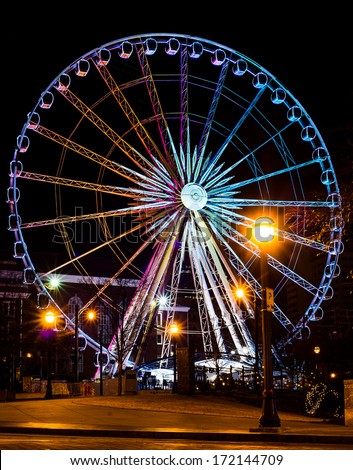 Ferris wheel at night in a summer carnival