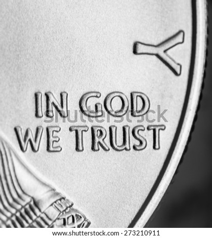 In God We Trust, Macro shot of Silver Dollar coin, with extremely low depth of field and focus field
