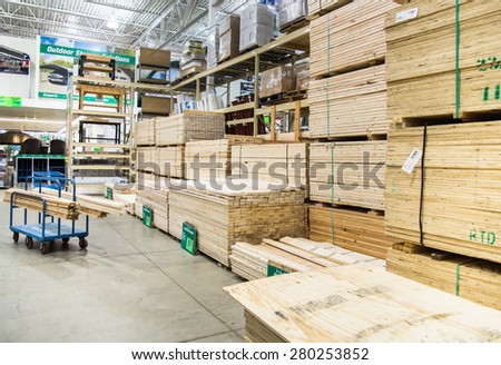 Chicago, IL April 2015: Wood stacked on shelving inside a lumber yard of a hardware store