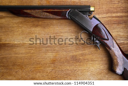 Shotgun on wood