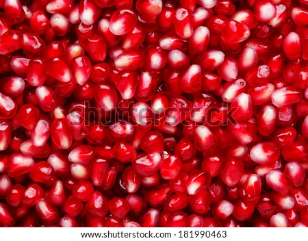 Fresh pomegranate seeds as a background