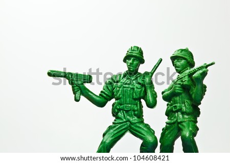 The closeup isolated image of the green toy soldier