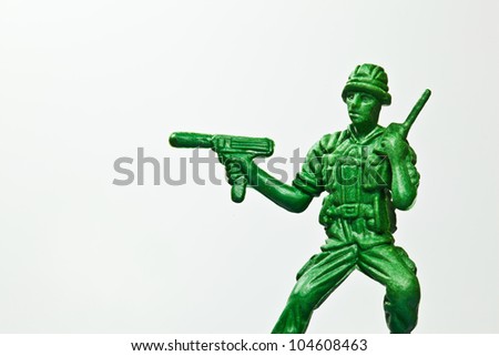 The closeup isolated image of the green toy soldier