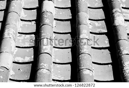 The black and white image of the pattern of old Chinese roof tiles