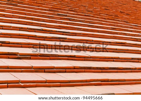 The Red Clay Roof Tiles of a House in the Countryside of Thailand