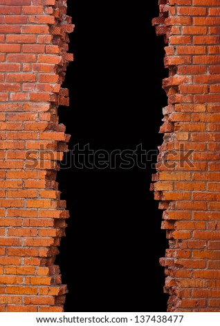 Broken into a brick wall with a black field