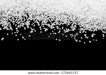 Spilling Sugar Closeup On Black Background