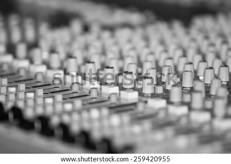 Fragment of a mixing console closeup
