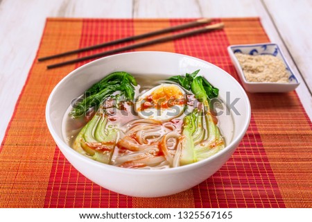 Healthy Asian Rice Noodles Soup with Bok Choi and Sesame Seeds