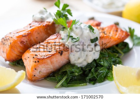 Grilled Salmon With Spinach, Tartare Cream And Lemon Wedges