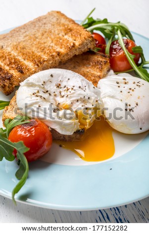 Poached Eggs with Wholegrain Bread Toasts and Vegetables