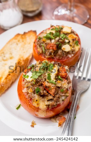 Baked Tomatoes Stuffed with Meat, Rice and Feta Cheese