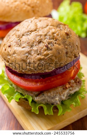 Healthy Chicken Hamburger with a Whole Grain Bun and Vegetables