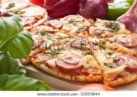sliced sausage and onion pizza