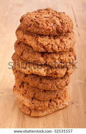big pile of cookies on wooden table