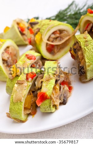 roasted squash marrow stuffed with vegetables and mushrooms