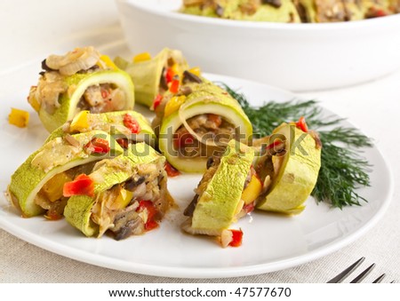 roasted marrow squash  stuffed with vegetables, meat and mushrooms