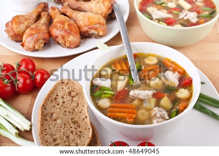 bowls of chicken and vegetable soup