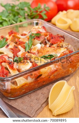 Stuffed Shell Pasta with Tomato Sauce and Cheese Baked with Ingredients