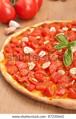 thin crust pizza alla marinara with tomatoes and garlic
