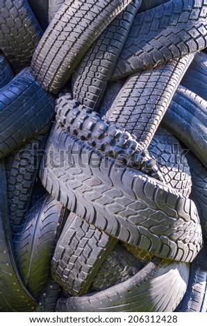 a lot of used car and truck tires background